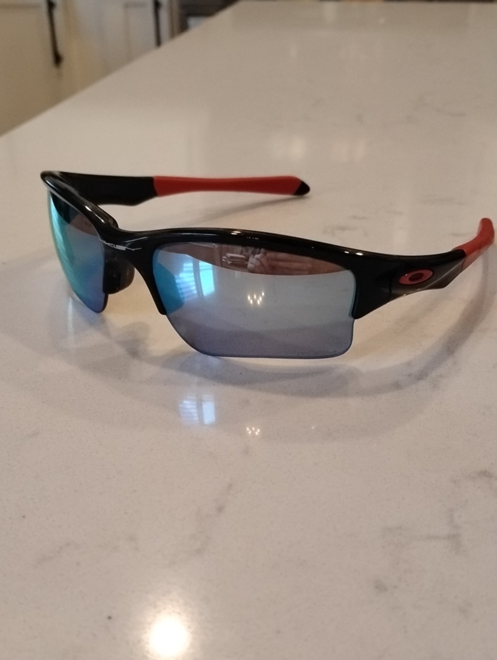 Oakley Youth Quarter Jacket Black with Red Temple Tips and Blue Mirror Lenses